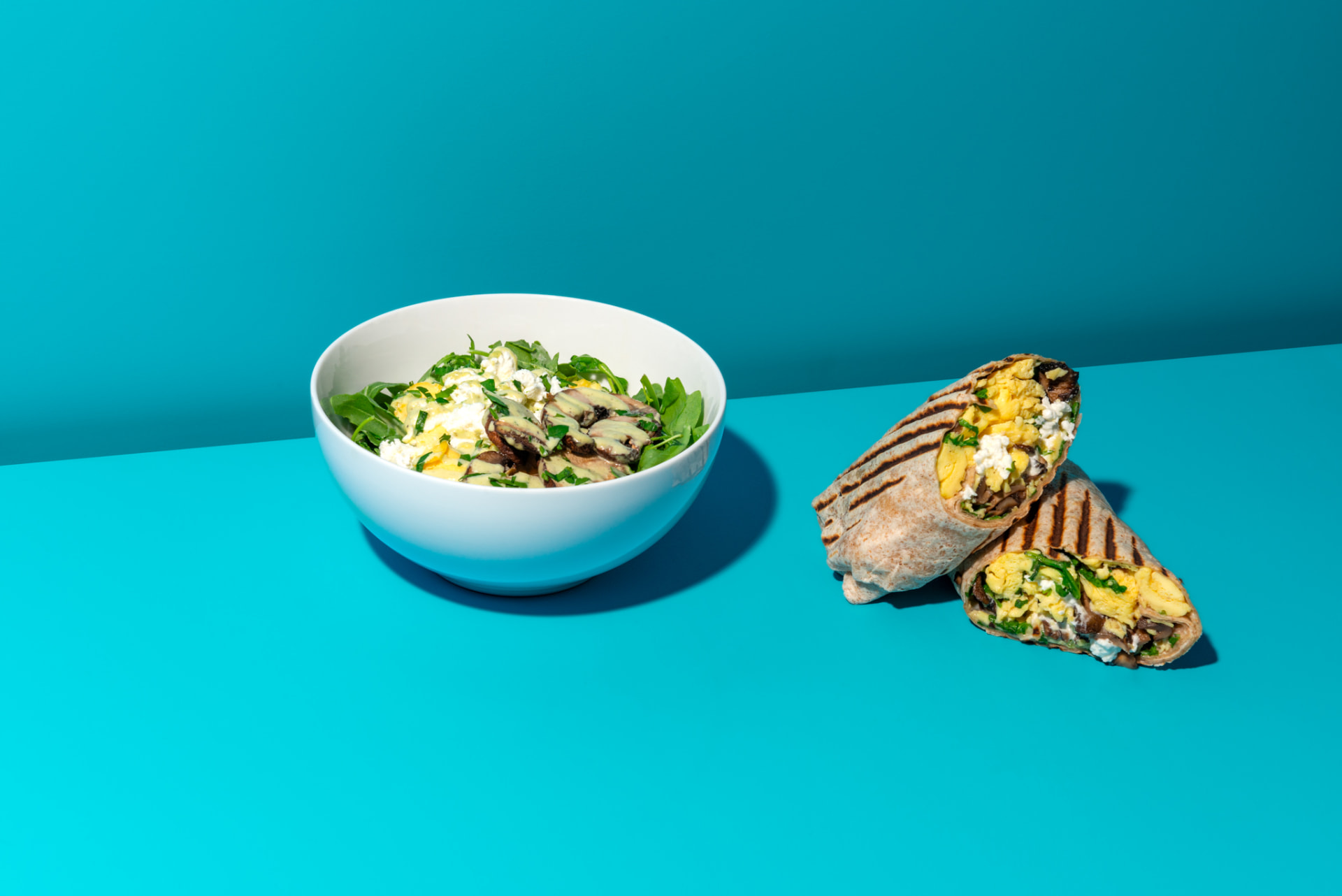 Protein Bar & Kitchen breakfast burritos and an egg-white breakfast bowl